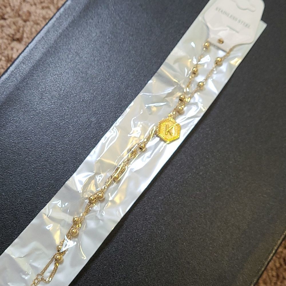 Stainless Steel, gold plated two chain "K" anklet. 8in chain